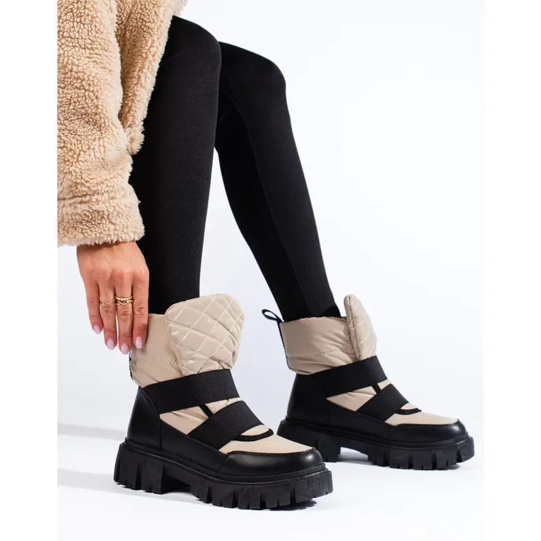 Women's Shelovet snow boots on a thick beige and black platform