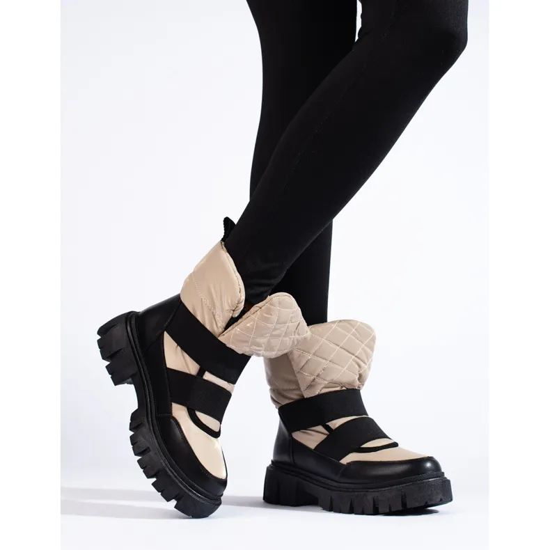 Women's Shelovet snow boots on a thick beige and black platform